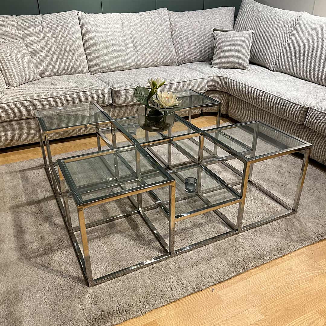 Glass and chrome multi tiered coffee table