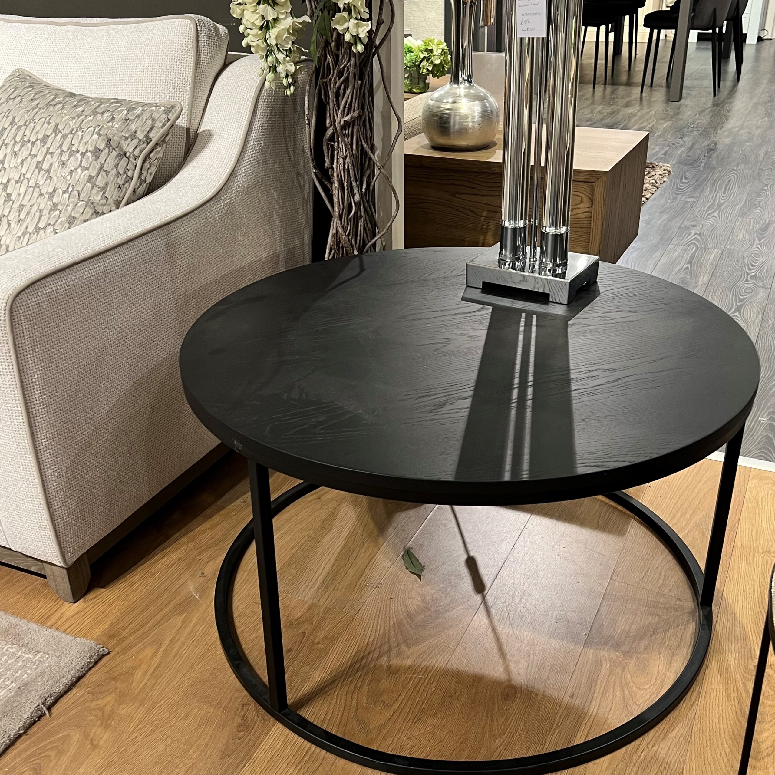 Round black oak coffee table