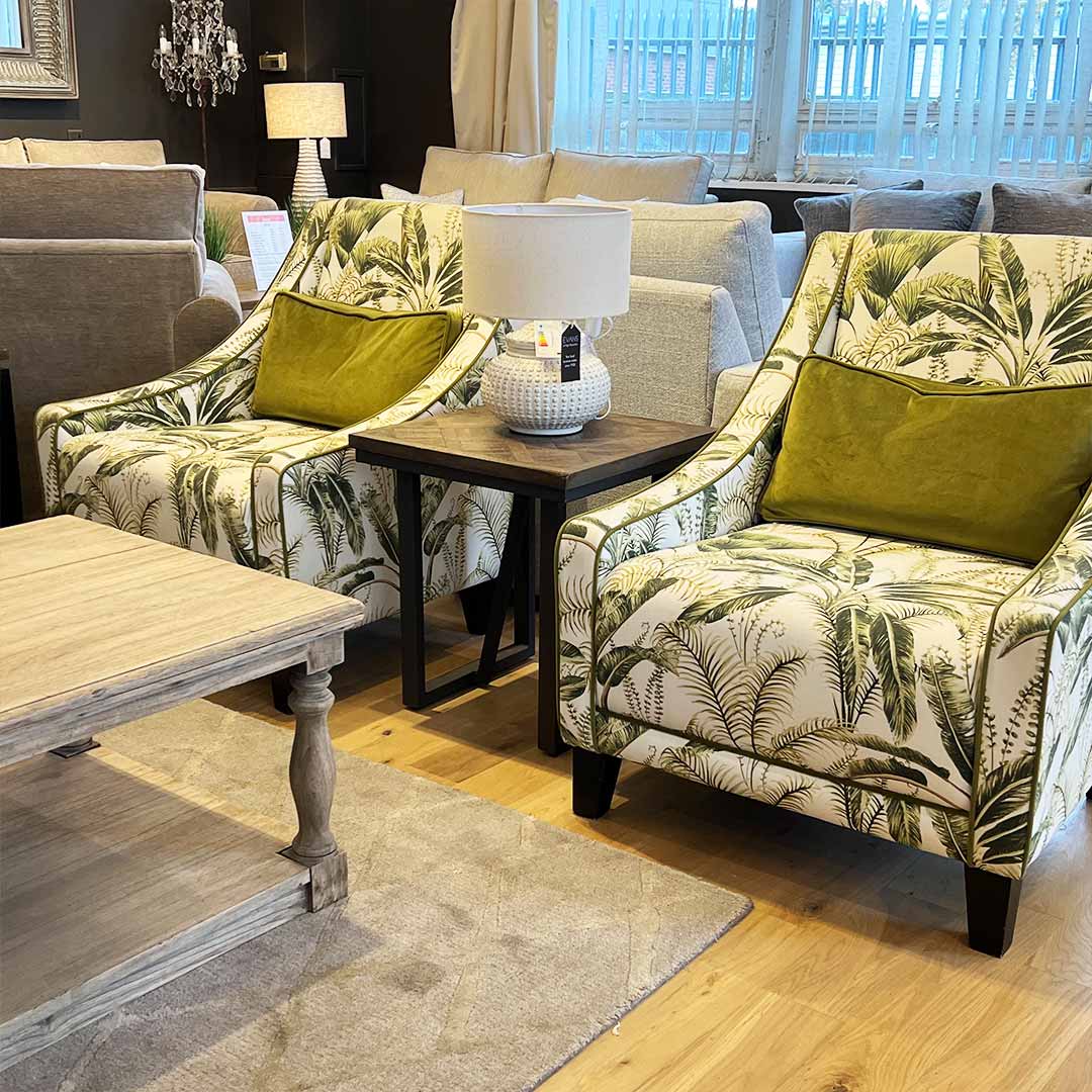 Pair of Matisse chairs i in a green leaf fabric handamde in high Wycombe