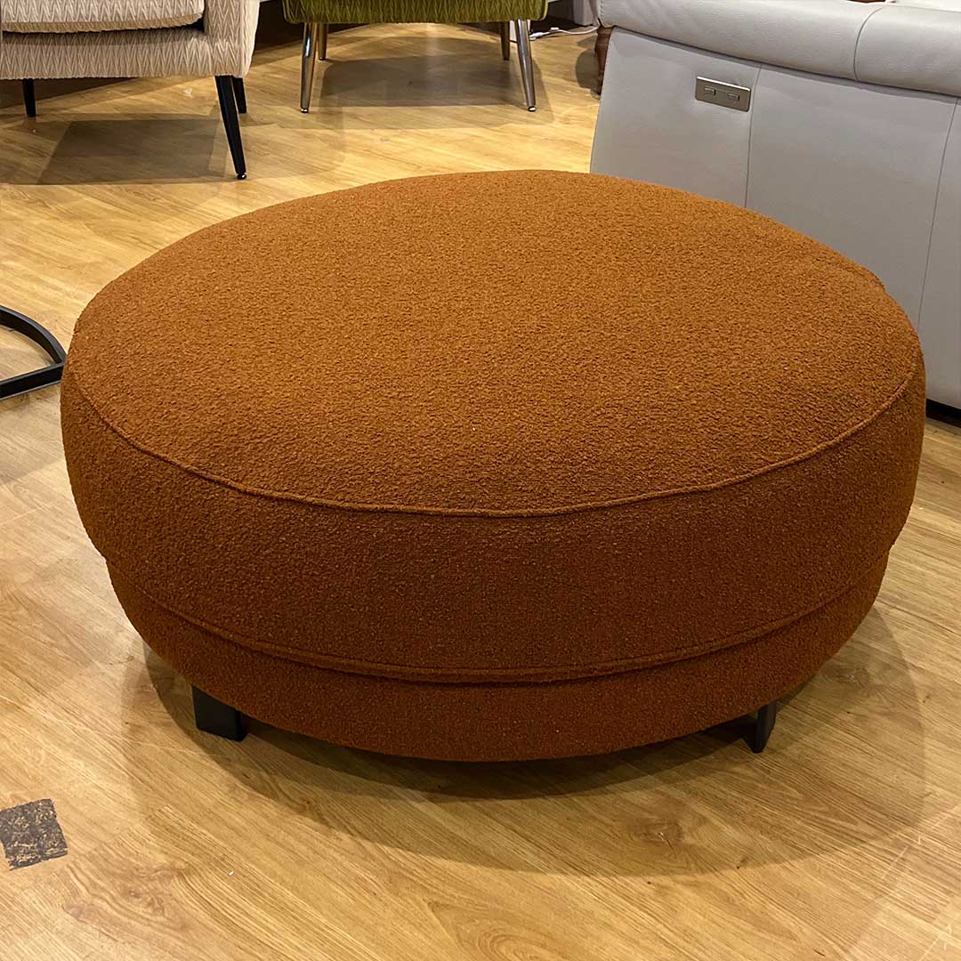 large orange round footstool