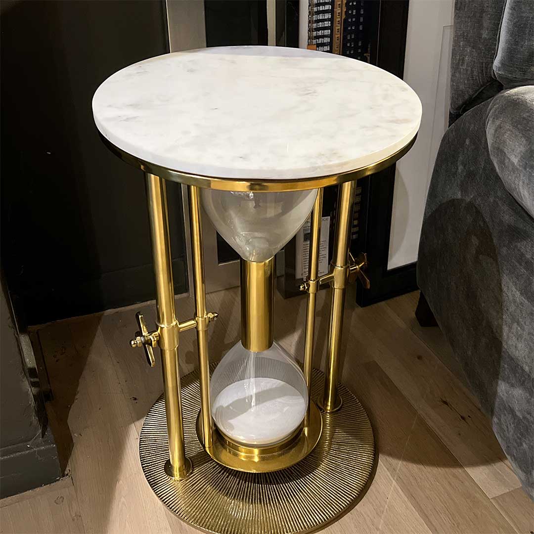 Tempus hour glass lamp table by Richmond Interiors. White marble top with gold accents