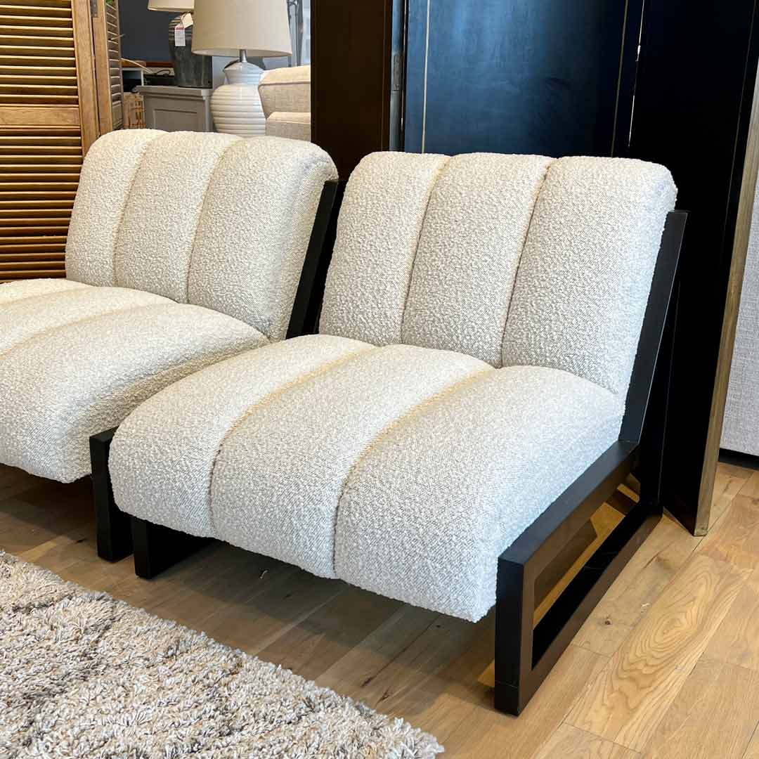 Boston armless chair. Contemporary relaxed chair design with black wooden frame