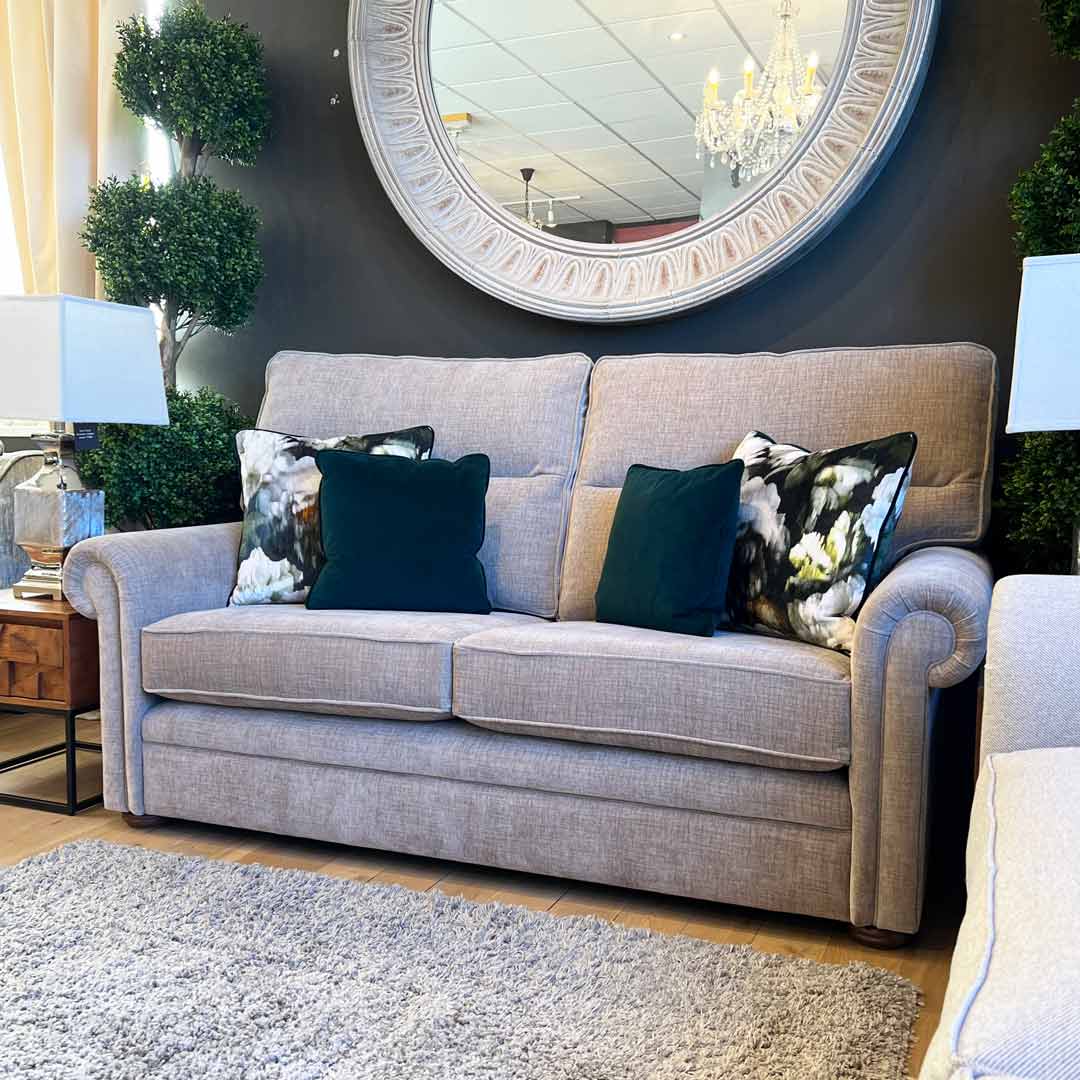 Cheltenham 2.5 seater sofa. A classic high back sofa with an elegant scroll arm. Finished in a neutral fabric.