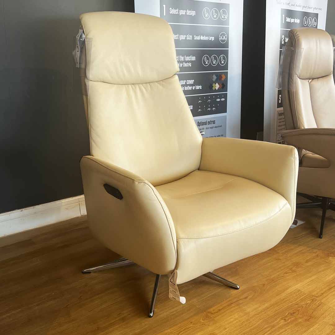 Copenhagen swivel power recliner chair in beige leather. Danish design