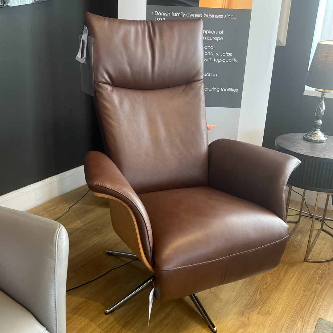 Nyborg swivel power reclining chair made in leather.