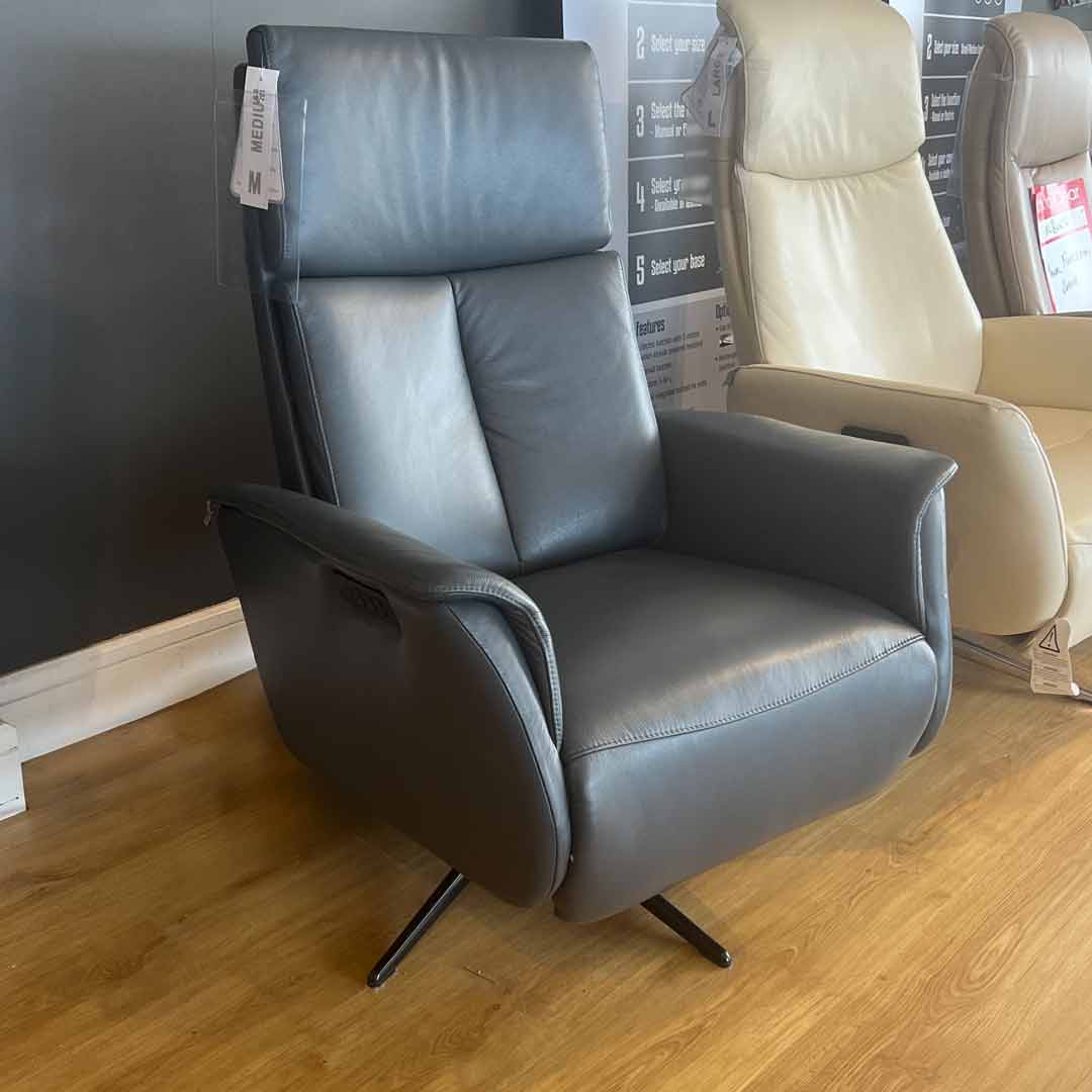 Odense power reclining swivel chair in leather. Danish design