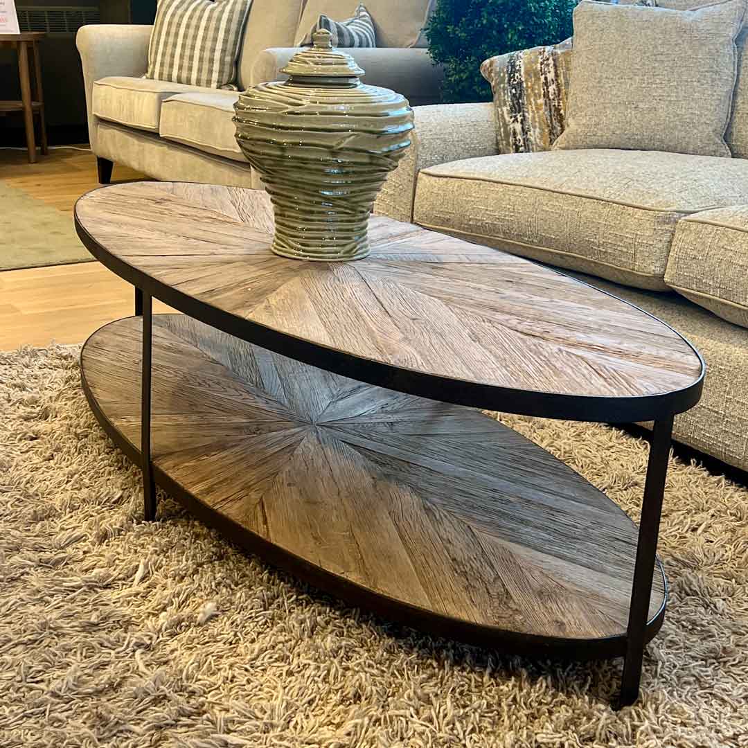 Reclaimed wood and black metal oval coffee table